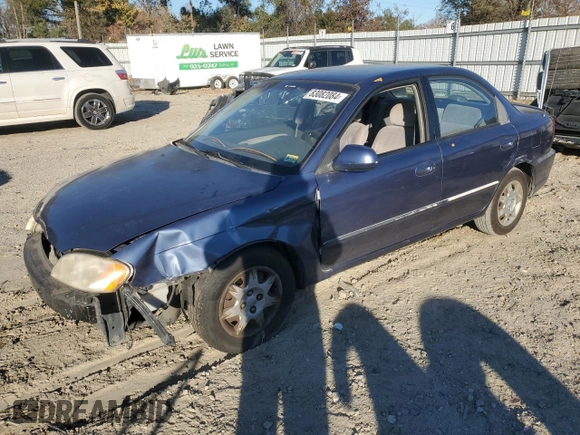 2004 Kia Spectra z VIN KNAFB121045315435, wystawiony jako Copart lot #83082084 z przebiegiem 94 974 mil mil oraz Czysty tytuł • Clean title. Historia ofert i sprzedaży dostępna na DreamBid. Obrazek 1.