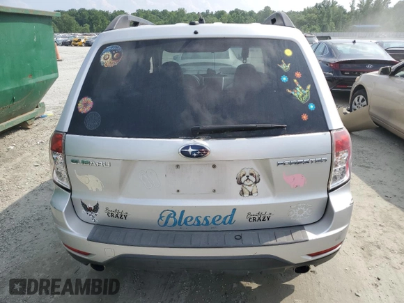 2009 Subaru Forester X Limited with VIN JF2SH64679H771672, listed as a Copart auction lot 59602445 with 148,429 mi miles and Salvage title. Bid and sale history available at DreamBid. Image 6.