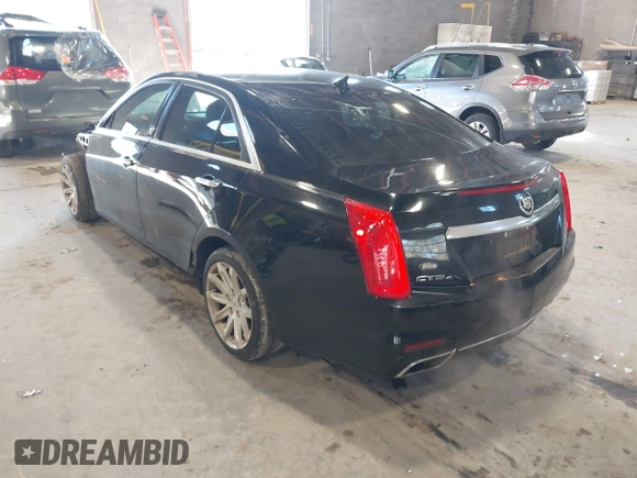 2014 Cadillac CTS Luxury AWD with VIN 1G6AX5S31E0143179, listed as a IAAI auction lot 41421639 with 135,810 mi miles and . Bid and sale history available at DreamBid. Image 3.