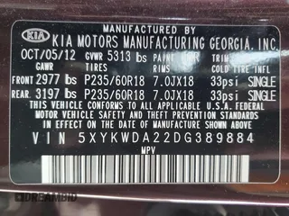 2013 Kia Sorento SX z VIN 5XYKWDA22DG389884, wystawiony jako Copart lot #58813735 z przebiegiem 101 567 mil mil oraz Szkoda całkowita • Salvage title. Historia ofert i sprzedaży dostępna na DreamBid. Obrazek 14.
