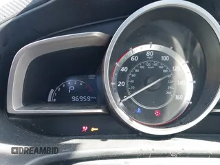 2016 Mazda 3 i Sport with VIN JM1BM1U73G1337468, listed as a IAAI auction lot 41824105 with 96,959 mi miles. Bid and sale history available at carsss.com. Image 16.