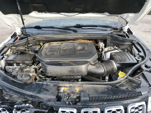 2021 Jeep Grand Cherokee Overland with VIN 1C4RJFCG1MC671472, listed as a Copart auction lot 86326714 with 103,760 mi miles and Salvage Title. Bid and sale history available at carsss.com. Image 12.