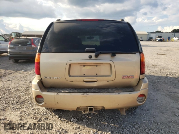 2007 GMC Envoy SLT with VIN 1GKDS13S972295861, listed as a Copart auction lot 74143314 with 167,332 mi miles and Salvage Title. Bid and sale history available at carsss.com. Image 6.