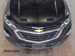 2019 Chevrolet Equinox LT z VIN 2GNAXTEV2K6259533, wystawiony jako IAAI lot #42556128 z przebiegiem 91 907 mil mil oraz . Historia ofert i sprzedaży dostępna na DreamBid. Obrazek 21.