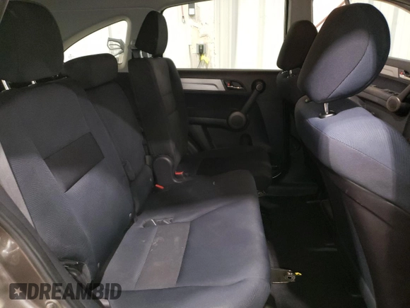 2011 Honda CR-V LX z VIN 3CZRE3H38BG704612, wystawiony jako Copart lot #53729555 z przebiegiem 100 947 mil mil oraz Szkoda całkowita • Salvage title. Historia ofert i sprzedaży dostępna na DreamBid. Obrazek 11.