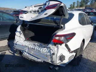 2023 Toyota Camry SE with VIN 4T1T11AKXPU167223, listed as a IAAI auction lot 41667076 with 31,658 mi miles and . Bid and sale history available at DreamBid. Image 4.