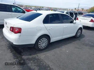 2010 Volkswagen Jetta Sedan S with VIN 3VWJZ7AJ9AM037277, listed as a IAAI auction lot 42044404 with 129,823 mi miles. Bid and sale history available at carsss.com. Image 4.