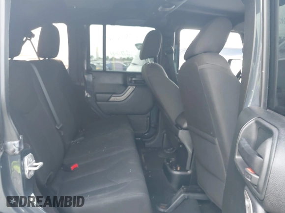 2018 Jeep Wrangler JK Unlimited Sport with VIN 1C4BJWDG5JL858936, listed as a IAAI auction lot 39953617 with 75,865 mi miles. Bid and sale history available at carsss.com. Image 8.