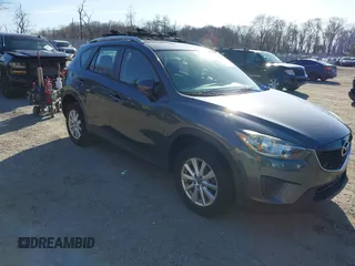 2013 Mazda CX-5 Sport with VIN JM3KE4BE3D0141748, listed as a IAAI auction lot 41836498 with 163,118 mi miles. Bid and sale history available at carsss.com. Image 1.