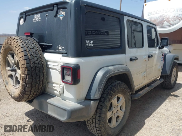 2018 Jeep Wrangler Unlimited Sport S with VIN 1C4HJXDG8JW127299, listed as a IAAI auction lot 42091561 with 116,082 mi miles and . Bid and sale history available at DreamBid. Image 4.