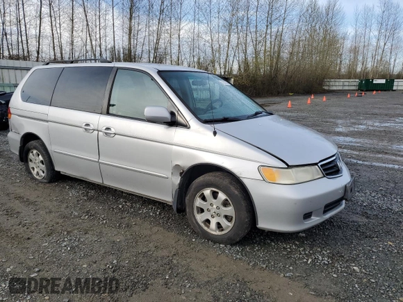 2002 Honda Odyssey EX z VIN 2HKRL18692H578746, wystawiony jako Copart lot #51281845 z przebiegiem 282 844 mil mil oraz Szkoda całkowita • Salvage title. Historia ofert i sprzedaży dostępna na DreamBid. Obrazek 4.