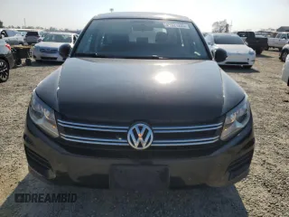 2014 Volkswagen Tiguan SE z VIN WVGAV3AX3EW512497, wystawiony jako Copart lot #43221255 z przebiegiem 94 633 mil mil oraz Szkoda całkowita • Salvage title. Historia ofert i sprzedaży dostępna na DreamBid. Obrazek 5.