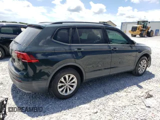 2018 Volkswagen Tiguan S with VIN 3VV0B7AX4JM042248, listed as a Copart auction lot 65202625 with 102,021 mi miles and Salvage title. Bid and sale history available at DreamBid. Image 3.
