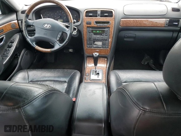 2005 Hyundai XG z VIN KMHFU45E55A381660, wystawiony jako Copart lot #45804805 z przebiegiem 130 480 mil mil oraz Szkoda całkowita • Salvage title. Historia ofert i sprzedaży dostępna na DreamBid. Obrazek 8.
