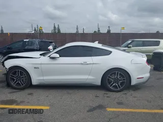 2021 Ford Mustang GT with VIN 1FA6P8CF5M5115597, listed as a IAAI auction lot 42142619 with 101,687 mi miles and . Bid and sale history available at DreamBid. Image 13.