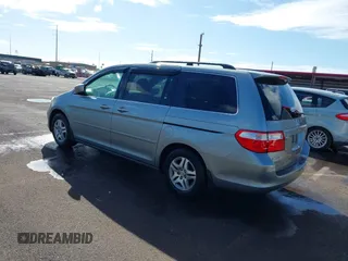 2007 Honda Odyssey EX-L with VIN 5FNRL38677B021464, listed as a IAAI auction lot 41568582 with 131,359 mi miles and . Bid and sale history available at DreamBid. Image 3.