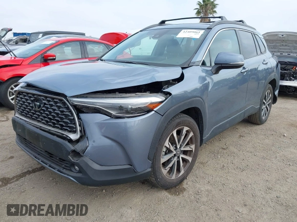 2022 Toyota Corolla Cross XLE with VIN 7MUDAABG6NV007009, listed as a IAAI auction lot 42409061 with 37,178 mi miles and . Bid and sale history available at DreamBid. Image 23.