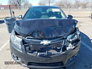 2014 Chevrolet Cruze 1LT with VIN 1G1PC5SB5E7482067, listed as a IAAI auction lot 41697625 with 51,036 mi miles and . Bid and sale history available at DreamBid. Image 12.