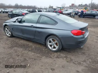 2014 BMW 4 Series 428i xDrive with VIN WBA3N9C50EK246002, listed as a IAAI auction lot 41612256 with 100,915 mi miles and . Bid and sale history available at carsss.com. Image 3.