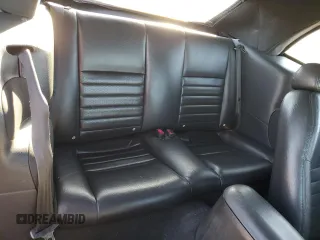 2004 Ford Mustang GT Deluxe z VIN 1FAFP45X14F206570, wystawiony jako Copart lot #48405375 z przebiegiem 103 563 mil mil oraz Szkody całkowita. Historia ofert i sprzedaży dostępna na DreamBid. Obrazek 10.
