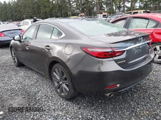2018 Mazda 6 Grand Touring with VIN JM1GL1TYXJ1301545, listed as a IAAI auction lot 41131114 with 34,089 mi miles and . Bid and sale history available at DreamBid. Image 3.