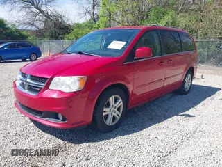 2013 Dodge Grand Caravan Crew with VIN 2C4RDGDG3DR571425, listed as a IAAI auction lot 42135973 with 254,153 mi miles and . Bid and sale history available at DreamBid. Image 2.