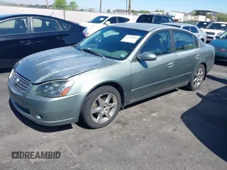 2006 Nissan Altima SE z VIN 1N4BL11DX6N401712, wystawiony jako IAAI lot #42350080 z przebiegiem 170 888 mil mil oraz . Historia ofert i sprzedaży dostępna na DreamBid. Obrazek 2.