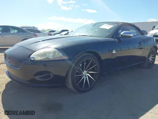 2007 Jaguar XK with VIN SAJDA44B375B02282, listed as a IAAI auction lot 42046463 with 117,595 mi miles. Bid and sale history available at carsss.com. Image 2.