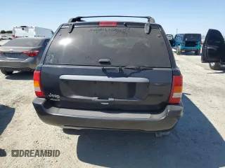 2004 Jeep Grand Cherokee Laredo with VIN 1J4GW48S84C182135, listed as a Copart auction lot 62224975 with 187,938 mi miles and Clean title. Bid and sale history available at DreamBid. Image 6.
