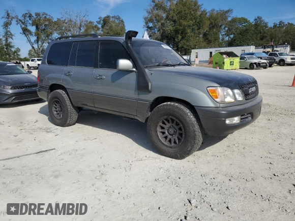 2002 Lexus LX 470 z VIN JTJHT00W723514716, wystawiony jako Copart lot #42646295 z przebiegiem 188 817 mil mil oraz Szkoda całkowita • Salvage title. Historia ofert i sprzedaży dostępna na DreamBid. Obrazek 4.