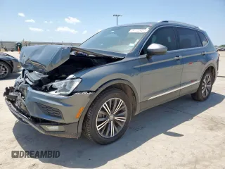 2018 Volkswagen Tiguan SEL with VIN 3VV3B7AX8JM061589, listed as a Copart auction lot 64128415 with 186,912 mi miles and Salvage title. Bid and sale history available at DreamBid. Image 1.