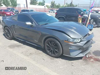 2019 Ford Mustang EcoBoost with VIN 1FA6P8TH5K5181274, listed as a IAAI auction lot 42719275 with 91,605 mi miles and . Bid and sale history available at DreamBid. Image 1.