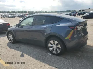 2023 Tesla Model Y Long Range z VIN 7SAYGDEE2PA041350, wystawiony jako Copart lot #56657005 z przebiegiem 25 090 mil mil oraz Szkoda całkowita • Salvage title. Historia ofert i sprzedaży dostępna na DreamBid. Obrazek 2.
