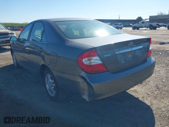 2004 Toyota Camry LE with VIN 4T1BF30K74U588368, listed as a IAAI auction lot 41659383 with 190,833 mi miles. Bid and sale history available at carsss.com. Image 3.
