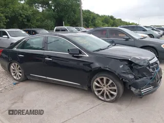 2017 Cadillac XTS Luxury z VIN 2G61M5S32H9158776, wystawiony jako IAAI lot #42528442 z przebiegiem 90 680 mil mil oraz . Historia ofert i sprzedaży dostępna na DreamBid. Obrazek 12.
