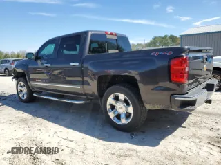 2014 Chevrolet Silverado 1500 LTZ with VIN 3GCUKSEC5EG211708, listed as a Copart auction lot 46094635 with 112,980 mi miles and Salvage Title. Bid and sale history available at DreamBid. Image 2.