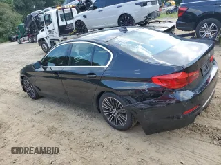 2020 BMW 5 Series with VIN WBAJB1C03LCD19170, listed as a Copart auction lot 64942594 with 66,584 mi miles and Salvage title. Bid and sale history available at DreamBid. Image 2.