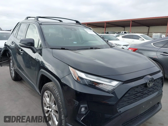 2022 Toyota RAV4 XLE Premium with VIN JTMC1RFV0ND085813, listed as a IAAI auction lot 42152401 with 86,707 mi miles and . Bid and sale history available at DreamBid. Image 1.
