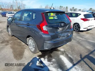 2017 Honda Fit LX with VIN JHMGK5H57HS007726, listed as a IAAI auction lot 41834608 with 97,442 mi miles. Bid and sale history available at carsss.com. Image 3.