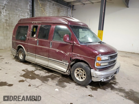 2002 Chevrolet Express z VIN 1GBFG15R921215686, wystawiony jako Copart lot #75614424 z przebiegiem Nie podano mil oraz Szkody całkowita. Historia ofert i sprzedaży dostępna na DreamBid. Obrazek 4.