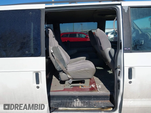 1997 GMC Safari with VIN 1GKDM19W5VB519516, listed as a IAAI auction lot 41662339 with 168,312 mi miles. Bid and sale history available at carsss.com. Image 8.