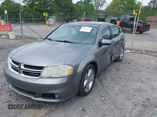 2011 Dodge Avenger Lux with VIN 1B3BD2FG5BN577918, listed as a IAAI auction lot 42094755 with 144,395 mi miles and . Bid and sale history available at DreamBid. Image 2.