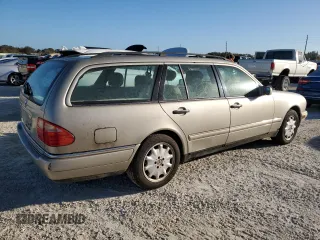 1998 Mercedes-Benz E-Class with VIN WDBJH65F9WA597132, listed as a Copart auction lot 77780094 with 0 mi miles and Salvage Title. Bid and sale history available at carsss.com. Image 3.