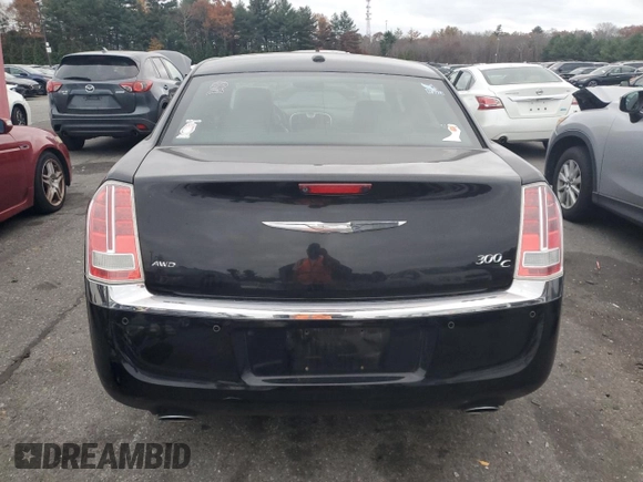 2012 Chrysler 300 C with VIN 2C3CCAKT9CH202809, listed as a Copart auction lot 79215864 with 121,610 mi miles and Salvage Title. Bid and sale history available at DreamBid. Image 6.