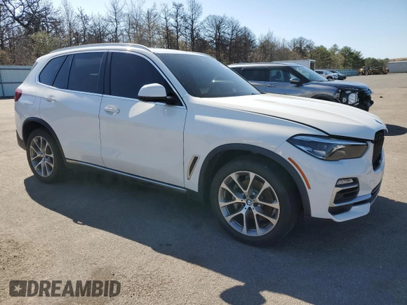 2020 BMW X5 xDrive40i with VIN 5UXCR6C09L9C13127, listed as a Copart auction lot 53941035 with 76,685 mi miles and Salvage title. Bid and sale history available at DreamBid. Image 4.