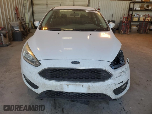 2016 Ford Focus SE with VIN 1FADP3F2XGL253039, listed as a Copart auction lot 45590535 with 104,933 mi miles and Salvage Title. Bid and sale history available at carsss.com. Image 5.