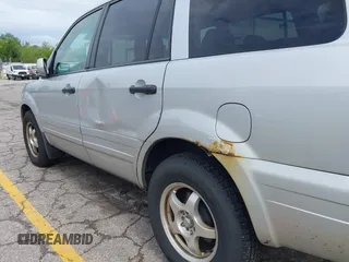 2004 Honda Pilot EX z VIN 2HKYF18524H542877, wystawiony jako IAAI lot #42340950 z przebiegiem 254 786 mil mil oraz . Historia ofert i sprzedaży dostępna na DreamBid. Obrazek 12.