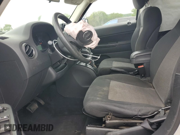 2011 Jeep Patriot Sport with VIN 1J4NT1GBXBD146292, listed as a Copart auction lot 56982555 with 241,524 mi miles and Salvage title. Bid and sale history available at DreamBid. Image 7.