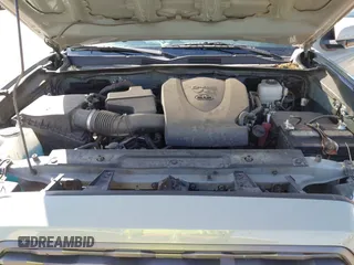 2022 Toyota Tacoma SR with VIN 3TMCZ5AN0NM489420, listed as a IAAI auction lot 42597175 with 129,340 mi miles and . Bid and sale history available at DreamBid. Image 10.