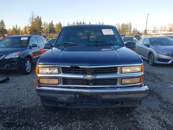 1997 Chevrolet Tahoe with VIN 1GNEK13R4VJ418974, listed as a IAAI auction lot 41560411 with 198,170 mi miles. Bid and sale history available at carsss.com. Image 12.